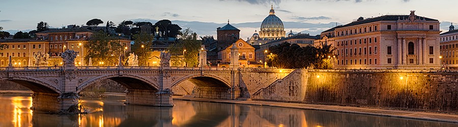 A twilight view of Rome overlooking the Vatican from my favorite Roman Bridge, Ponte Sant'Angelo.